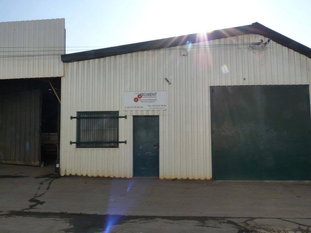 Façade de l'atelier de la Société Froment avec son enseigne